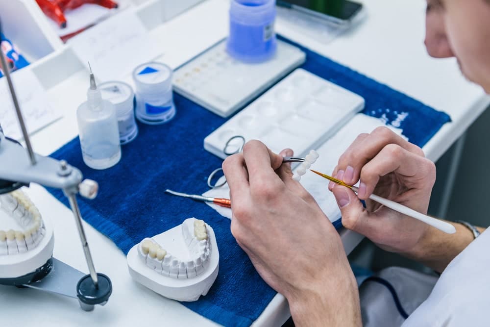 Dentures Vs Implants