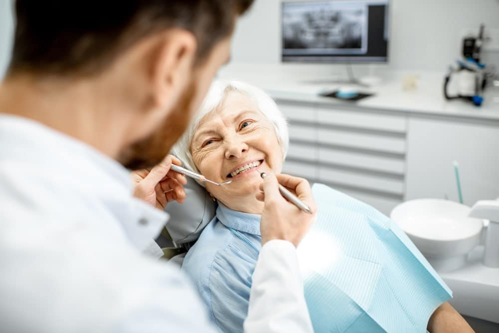 Dentures Vs Implants